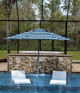 Stripped market in pool with shelf loungers