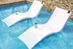 Two resort style loungers in pool shelf
